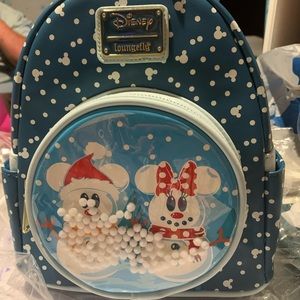 I have a Mickey and Minnie Mouse mini Loungefly back pack asking $60 brand new